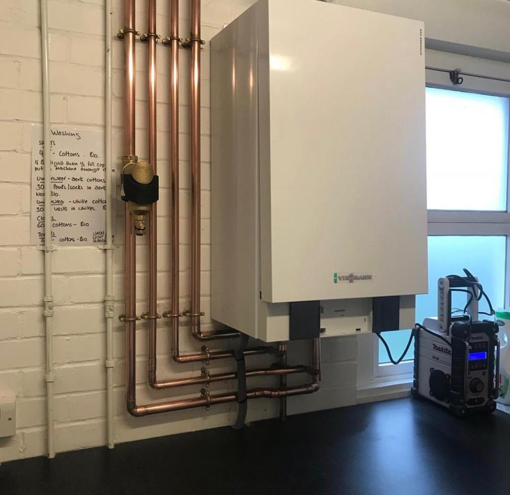 Heating system and boiler upgrade with weather compensation controls
